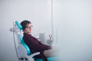 woman patient relaxed at the dentist